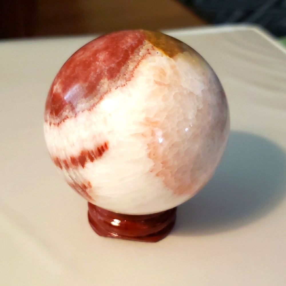 Rhodochrosite sphere AAAAA+